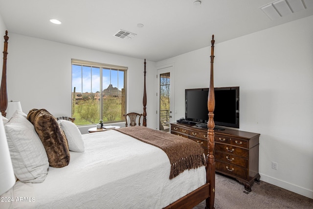 bedroom with light carpet and access to outside