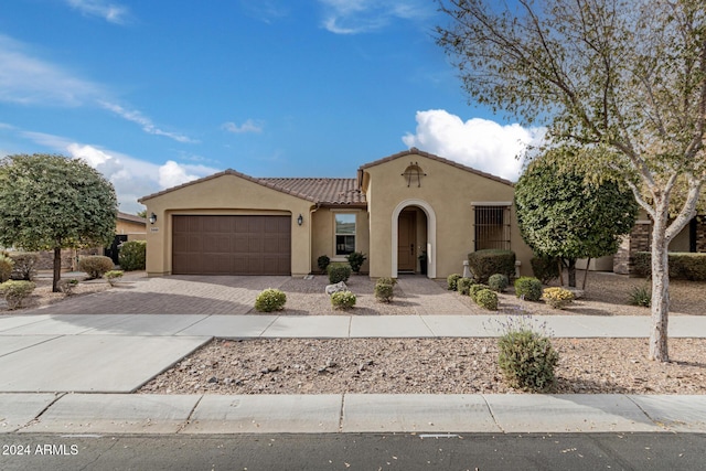 view of front of home with a garage