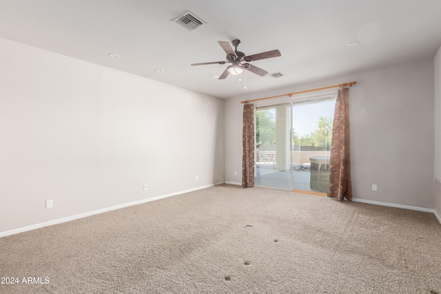 unfurnished room featuring carpet flooring and ceiling fan