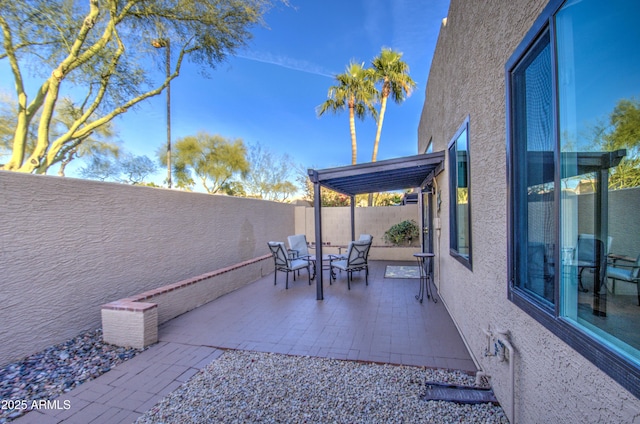 view of patio / terrace featuring a pergola