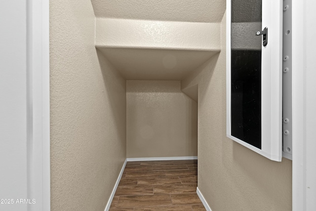 interior space with dark wood-type flooring