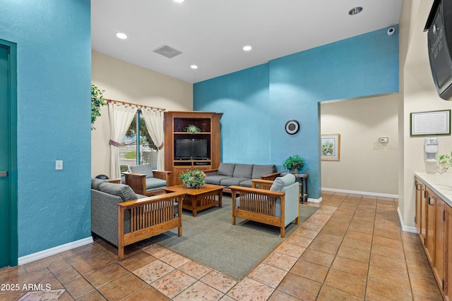 living room with light tile patterned floors