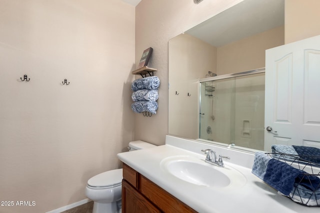 42160 W Arvada Ct, Maricopa, AZ 85138 - bathroom with a shower with door, toilet, and vanity