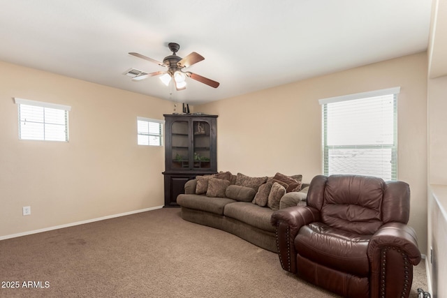 42160 W Arvada Ct, Maricopa, AZ 85138 - carpeted living room with a ceiling fan and baseboards