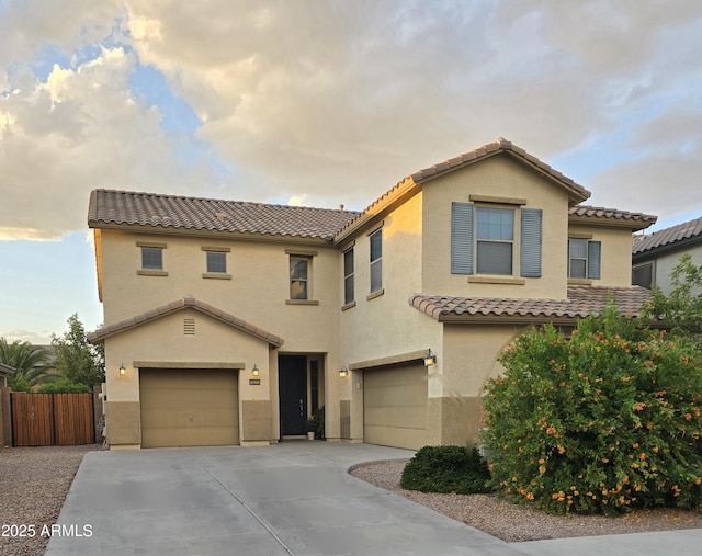 42160 W Arvada Ct, Maricopa, AZ 85138 - view of front of home featuring an attached garage, a tile roof, and stucco siding