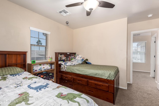 42160 W Arvada Ct, Maricopa, AZ 85138 - carpeted bedroom with baseboards and a ceiling fan