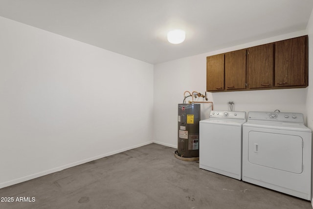 laundry area featuring cabinet space, baseboards, washer and clothes dryer, and electric water heater