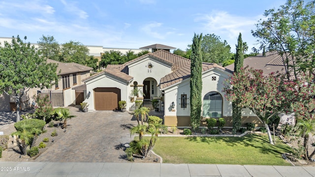 211 W New Dawn Dr, Chandler, AZ 85248 - mediterranean / spanish home with stucco siding, decorative driveway, a garage, and a tile roof