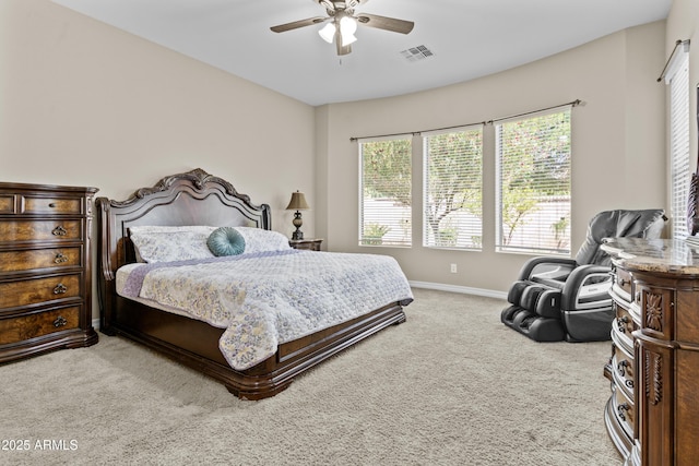 211 W New Dawn Dr, Chandler, AZ 85248 - bedroom with light colored carpet, baseboards, and a ceiling fan