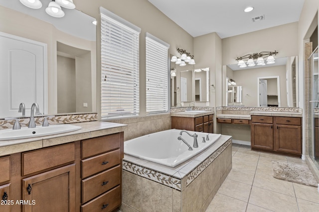 211 W New Dawn Dr, Chandler, AZ 85248 - full bath featuring two vanities, a shower stall, a bath, and tile patterned flooring
