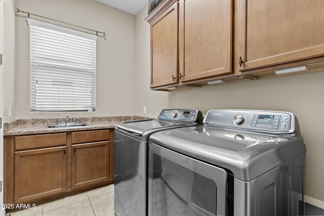 211 W New Dawn Dr, Chandler, AZ 85248 - laundry room featuring washing machine and dryer, cabinet space, and light tile patterned floors