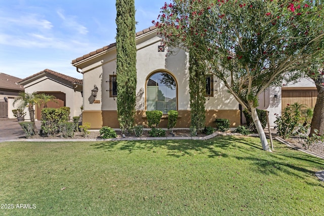 211 W New Dawn Dr, Chandler, AZ 85248 - mediterranean / spanish-style home featuring stucco siding, a tile roof, and a front yard