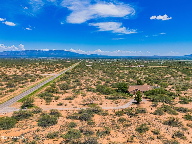 drone / aerial view featuring a mountain view