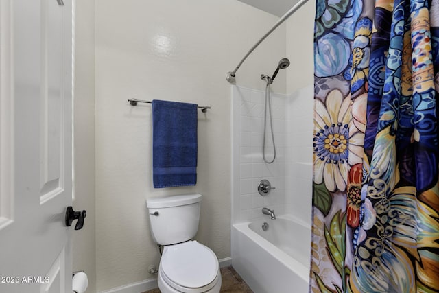 bathroom featuring shower / bath combination with curtain, tile patterned flooring, baseboards, and toilet