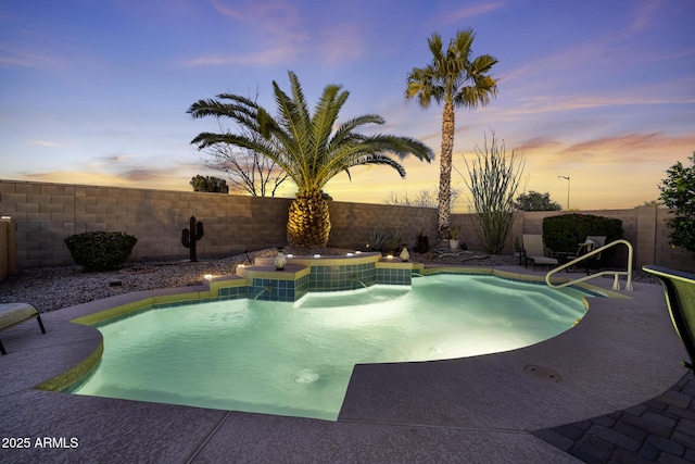 pool at dusk with a fenced in pool, a patio area, and a fenced backyard