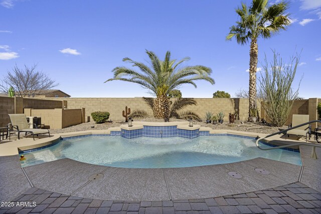 view of swimming pool featuring a fenced backyard and a fenced in pool