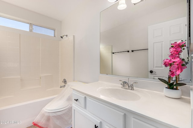 bathroom with vanity and shower / washtub combination