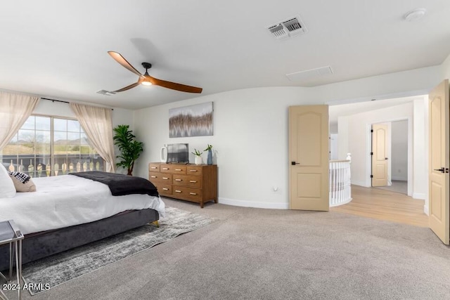 carpeted bedroom featuring ceiling fan and access to outside