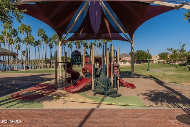 view of jungle gym with a yard