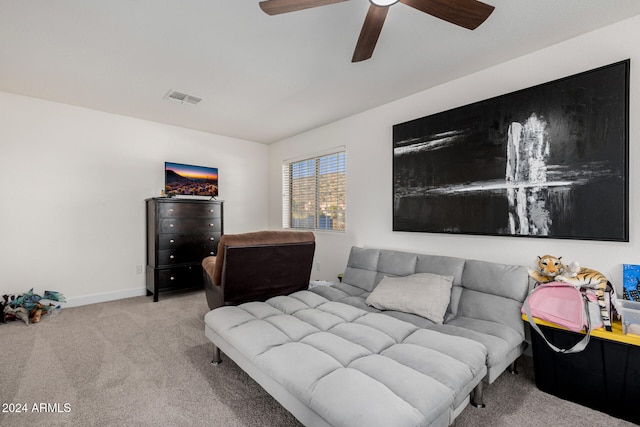 bedroom featuring ceiling fan and light colored carpet