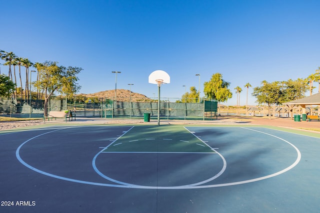 view of sport court with tennis court