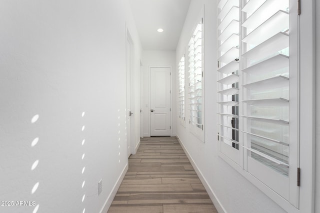 hallway featuring dark hardwood / wood-style floors