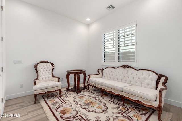 sitting room featuring light wood-type flooring