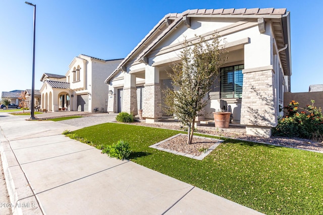 view of front of home with a front lawn