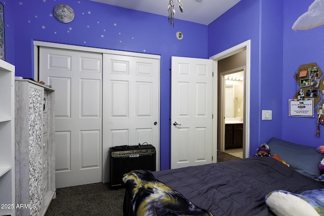 bedroom featuring a closet and carpet flooring