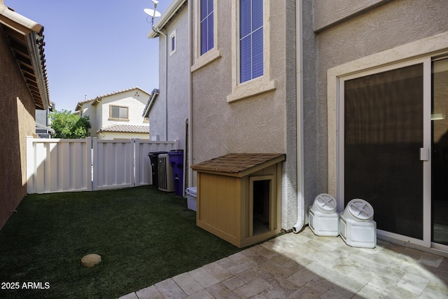 view of yard with a patio area and fence