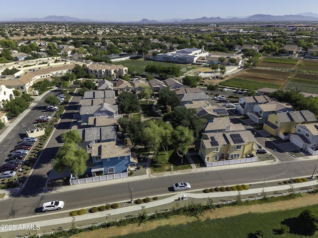 aerial view with a mountain view and a residential view