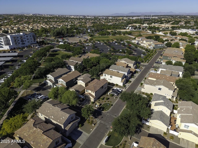 aerial view featuring a mountain view and a residential view
