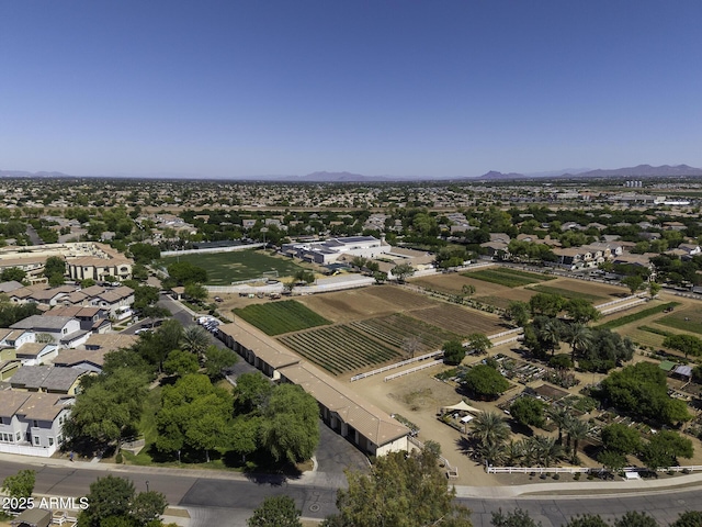 birds eye view of property featuring a mountain view