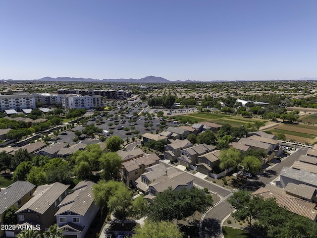 birds eye view of property with a residential view and a mountain view
