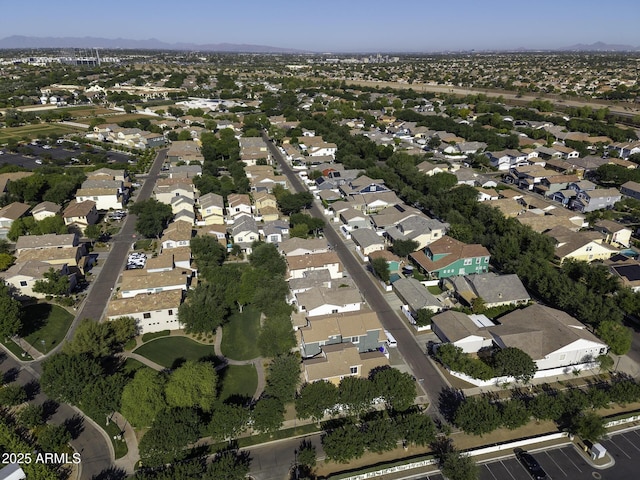 drone / aerial view with a residential view and a mountain view