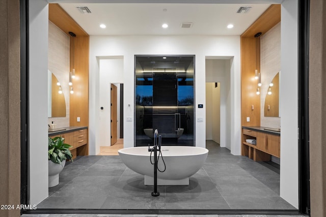 10249 E Joy Ranch Rd, Scottsdale, AZ 85262 - bathroom featuring vanity, a freestanding bath, and recessed lighting