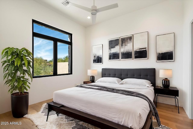 10249 E Joy Ranch Rd, Scottsdale, AZ 85262 - bedroom with wood finished floors, recessed lighting, and a ceiling fan