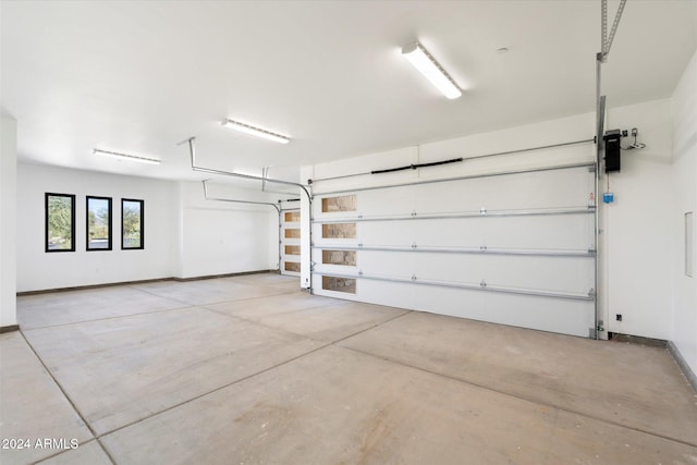 garage with baseboards