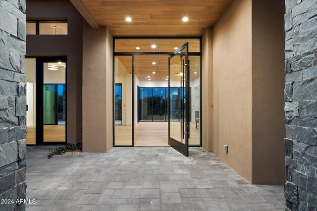 adobe home with a mountain view and a garage