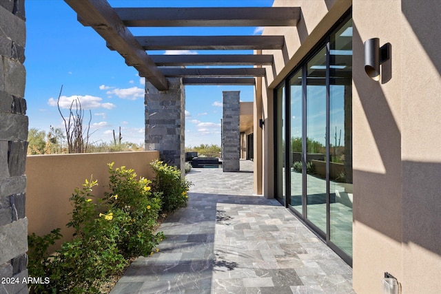 view of patio / terrace featuring a pergola