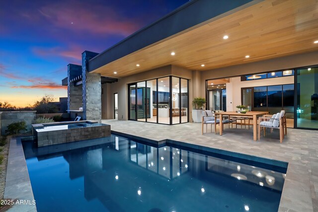 10249 E Joy Ranch Rd, Scottsdale, AZ 85262 - patio terrace at dusk with a pergola