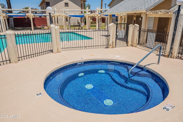 2455 E Broadway Rd Unit 115, Mesa, AZ 85204 - community pool featuring a community hot tub and a patio area