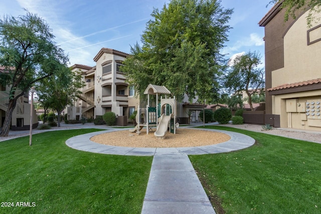 view of playground with a yard