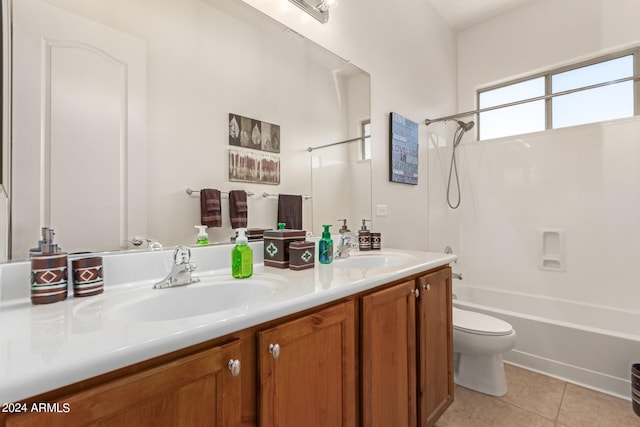 full bathroom with tile patterned floors, toilet, tub / shower combination, and vanity