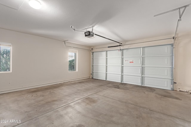 garage featuring a garage door opener