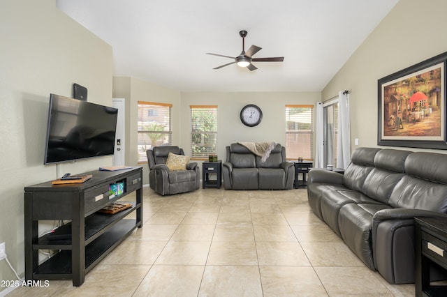 8331 E Plata Ave, Mesa, AZ 85212 - living area featuring light tile patterned floors, a ceiling fan, and vaulted ceiling