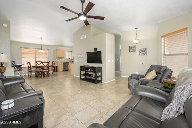8331 E Plata Ave, Mesa, AZ 85212 - living area with baseboards, visible vents, a ceiling fan, light tile patterned flooring, and lofted ceiling