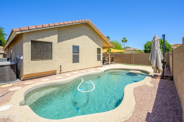 8331 E Plata Ave, Mesa, AZ 85212 - view of swimming pool featuring a patio, central air condition unit, a fenced in pool, and a fenced backyard