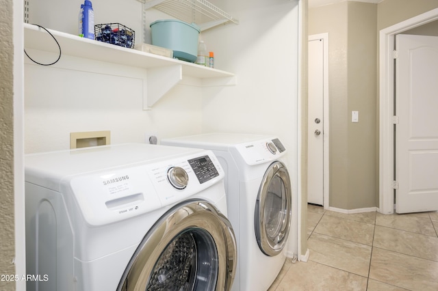 8331 E Plata Ave, Mesa, AZ 85212 - laundry room with light tile patterned floors, separate washer and dryer, laundry area, and baseboards