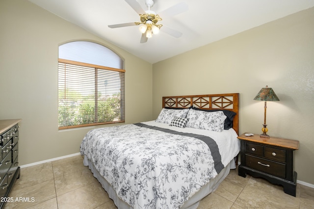 8331 E Plata Ave, Mesa, AZ 85212 - bedroom featuring light tile patterned flooring, a ceiling fan, vaulted ceiling, and baseboards
